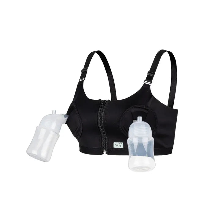 Hands-Free Pumping Bra shown in black - zip front, adjustable shoulder straps with bottles attached via flanges